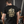 Load image into Gallery viewer, Back view of black Badges T-Shirt by Vintage Vices, male musician
